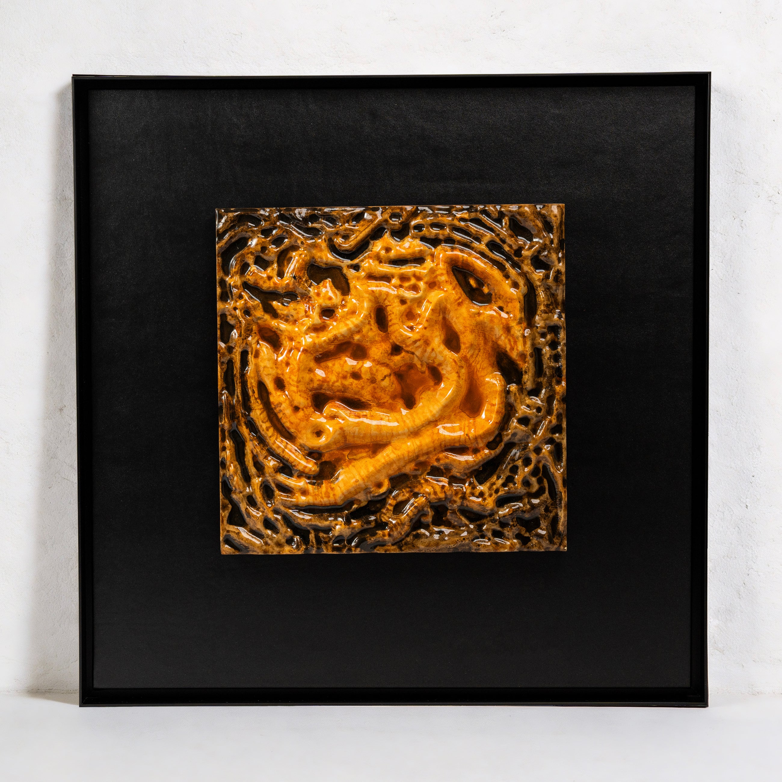 Coiled Dragon — Aquarelle · Aura Frame, full view of an earth element wall art with hand-modeled 3D ridge-and-mountain topography, its surface built through eight to ten passes of Tang Dynasty hand-dyeing technique graduating from light hazel ridgelines into deep umber valleys.