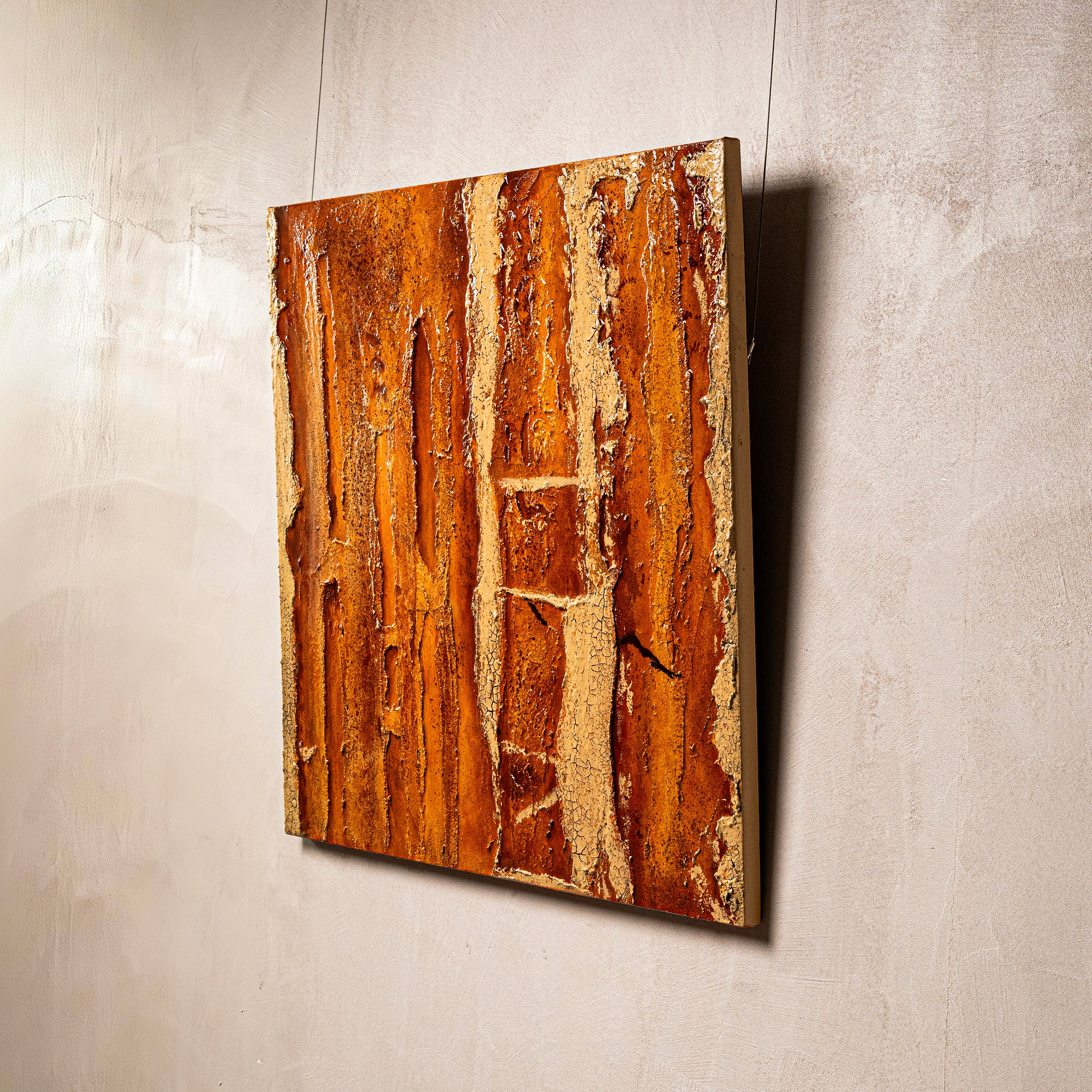 Gilded Terrain — macro surface detail capturing the luminous interplay of light across the textured earth element finish, evoking the quiet radiance of gilded, fertile ground.