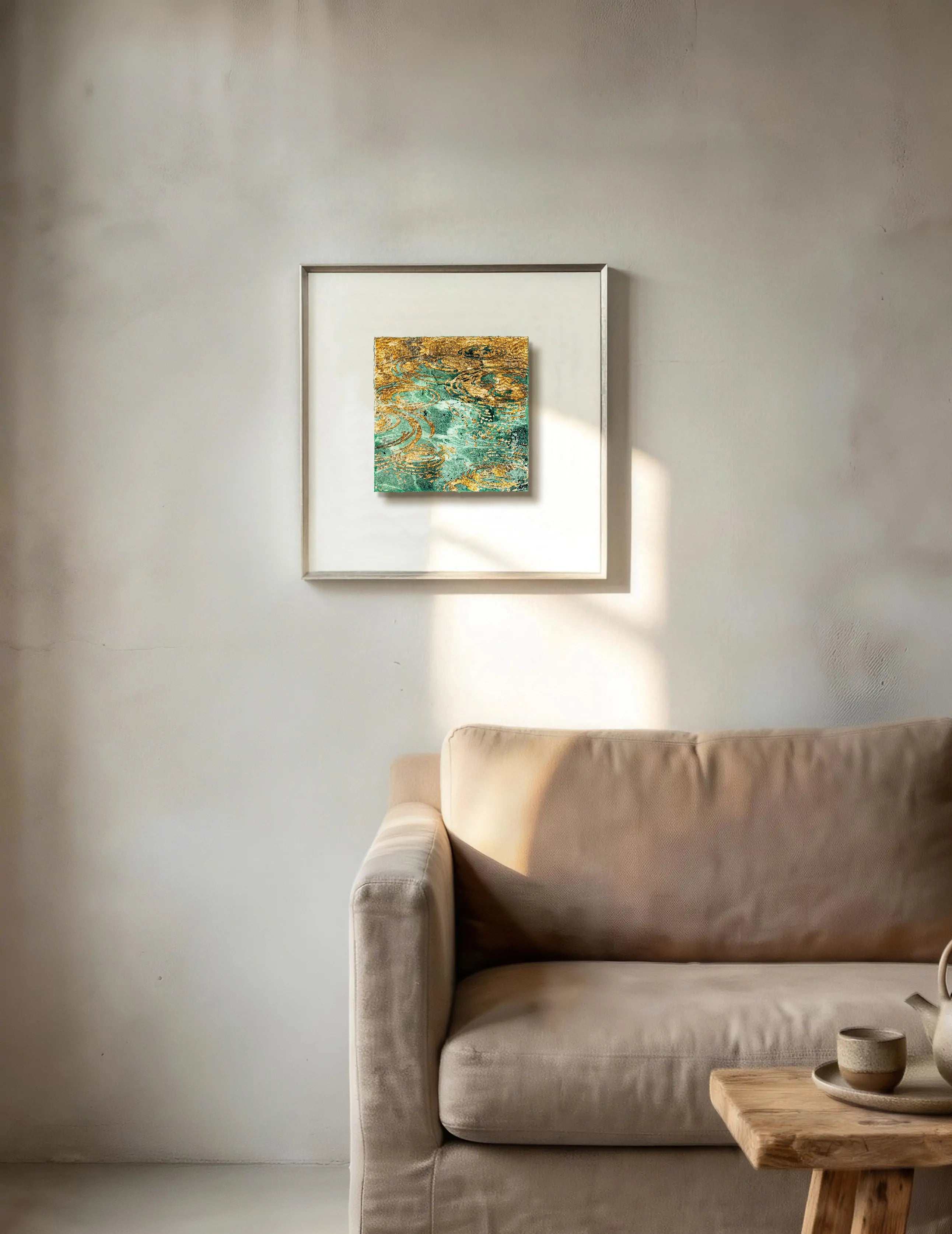 Still Water, Deep Current — Patinated Foil · Aura Frame — lifestyle scene of patinated foil art displayed in a serene interior, evoking water element stillness with subtle ripple movement across the framed canvas.