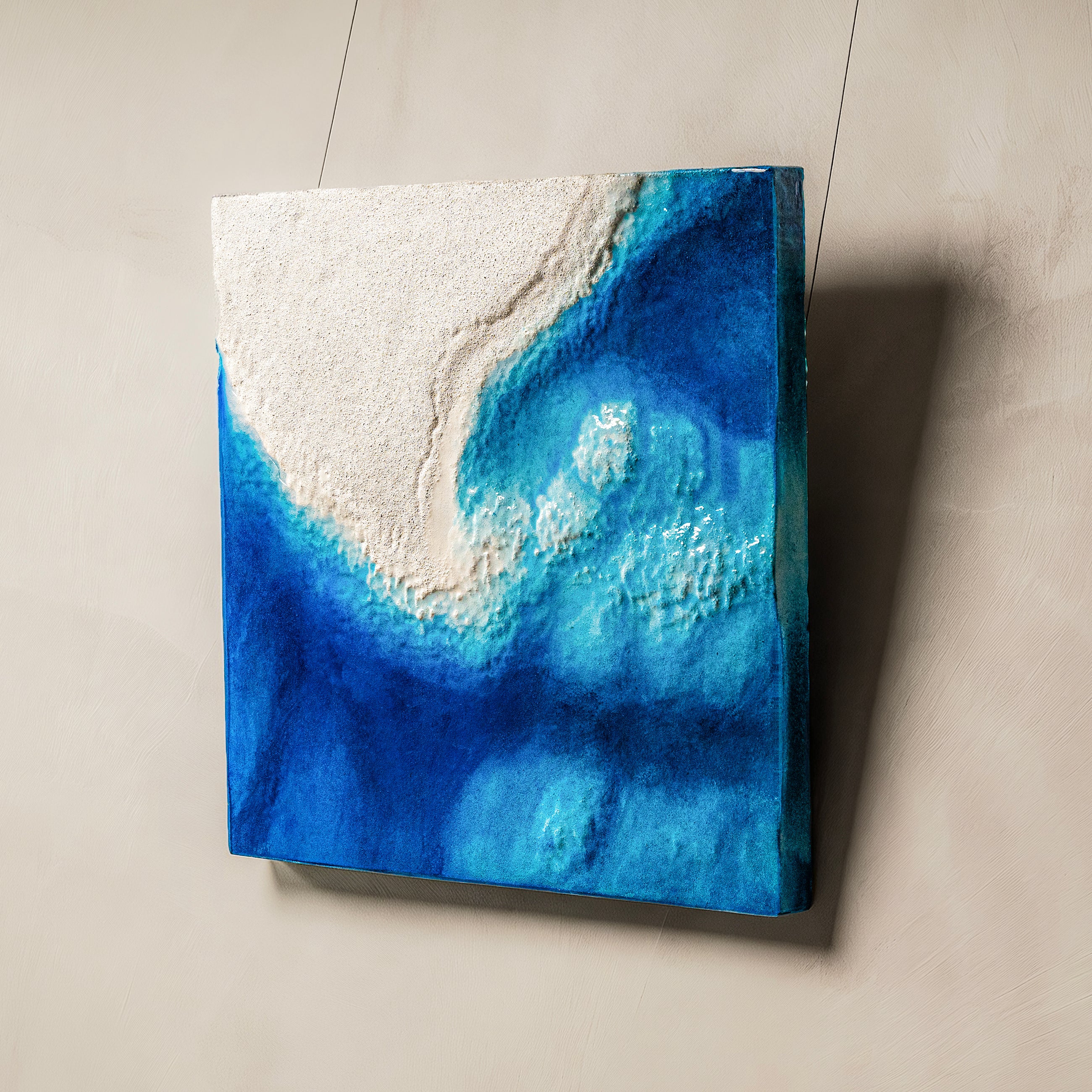 Abyssal Power — macro surface detail capturing the luminous interplay of light across the textured water element finish, evoking the serene yet powerful stillness of abyssal depths.