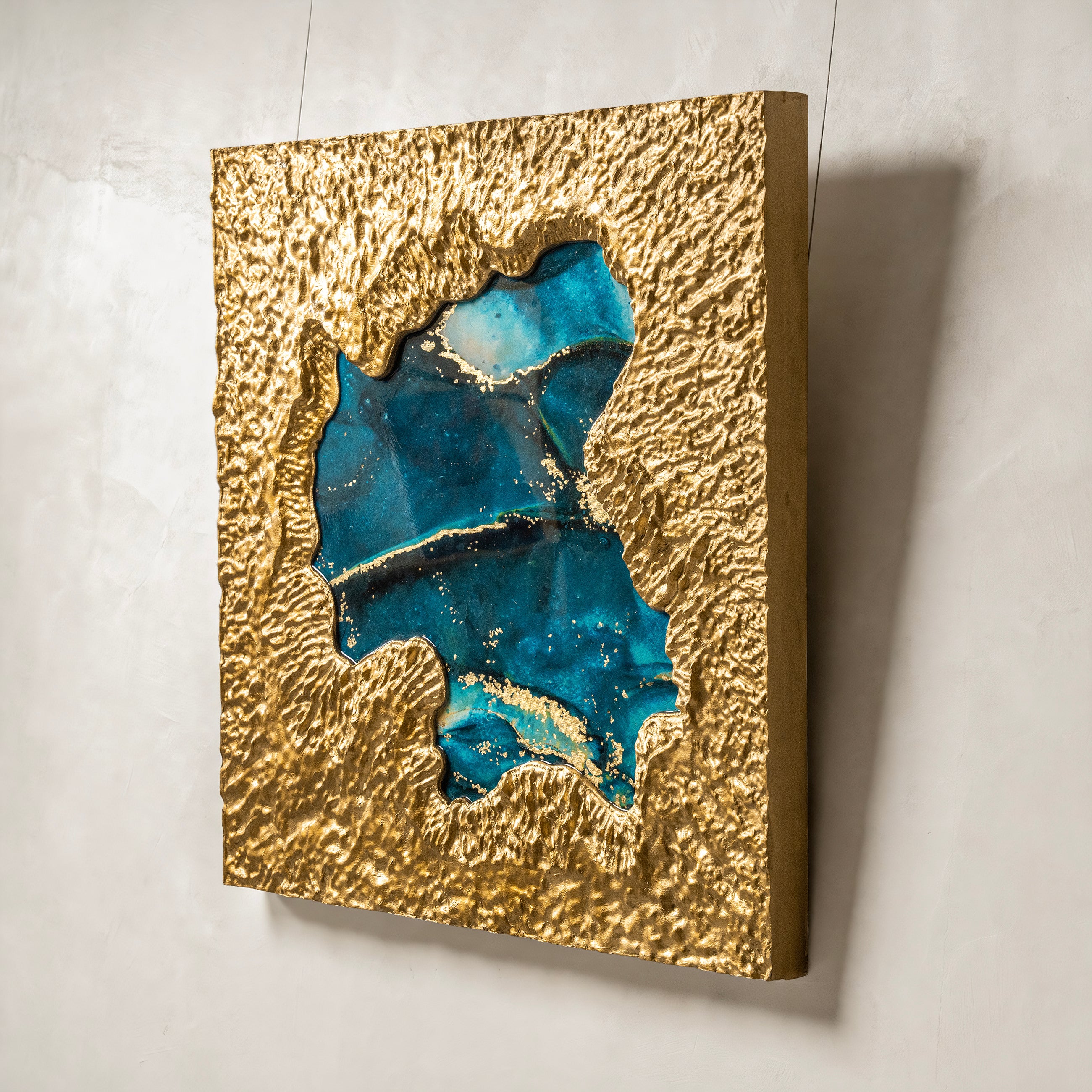 Mirror of Universe-blue — macro surface detail capturing the luminous interplay of light across the blue textured metal element finish, evoking the reflective stillness of a cosmic mirror.
