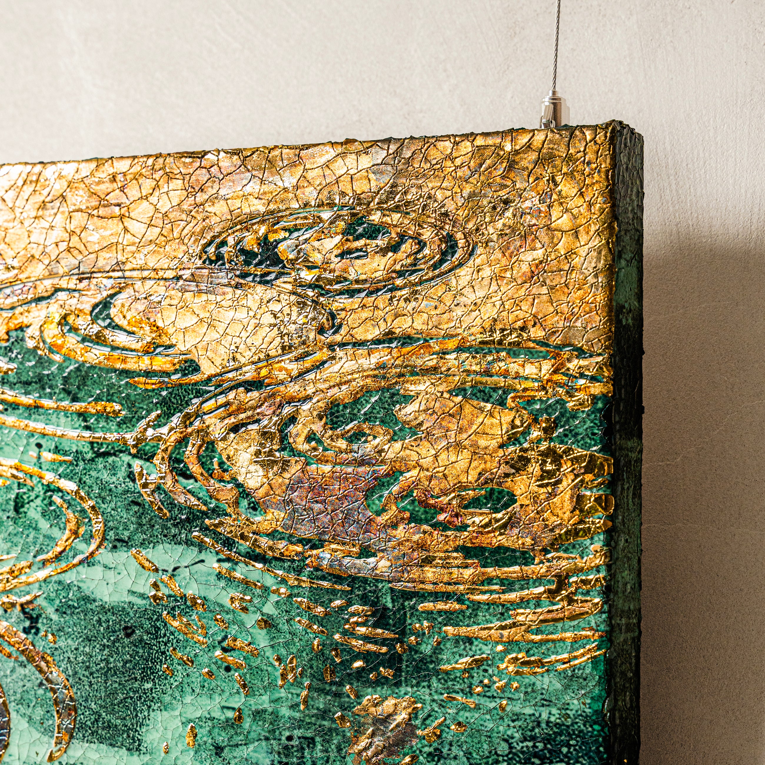 Top-right quarter angled side detail — foil relief dimension.
